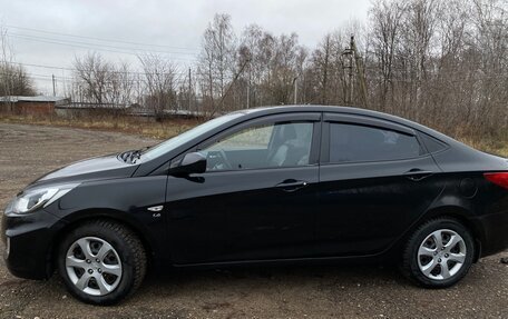 Hyundai Solaris II рестайлинг, 2011 год, 700 000 рублей, 7 фотография