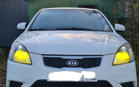 KIA Rio II, 2011 год, 690 000 рублей, 11 фотография