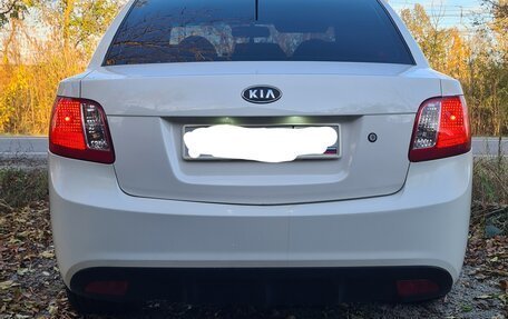 KIA Rio II, 2011 год, 690 000 рублей, 10 фотография