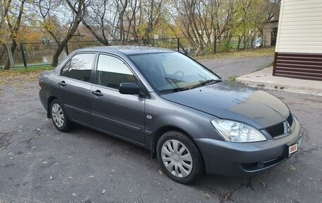 Mitsubishi Lancer IX, 2009 год, 395 000 рублей, 2 фотография