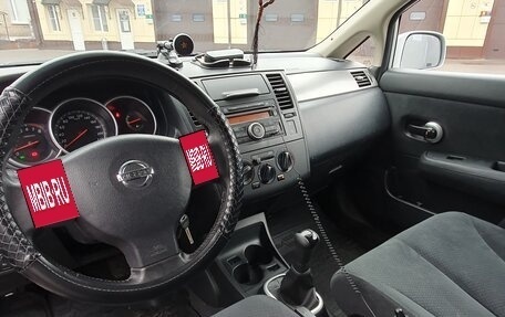 Nissan Tiida, 2010 год, 690 000 рублей, 9 фотография