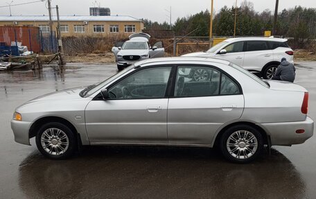 Mitsubishi Mirage VI рестайлинг, 2000 год, 380 000 рублей, 5 фотография