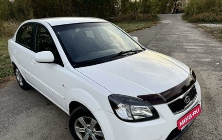 KIA Rio II, 2011 год, 670 000 рублей, 3 фотография