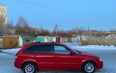 Mazda Familia Y11, 1999 год, 300 000 рублей, 14 фотография