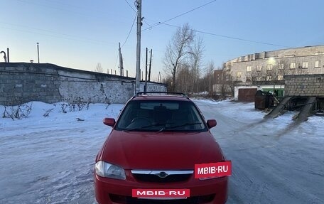 Mazda Familia Y11, 1999 год, 300 000 рублей, 15 фотография