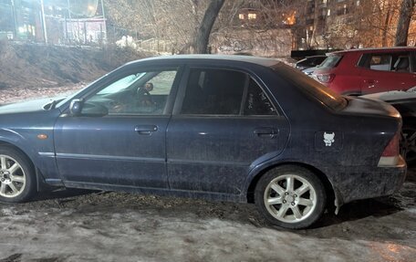 Ford Laser IV, 2002 год, 180 000 рублей, 5 фотография