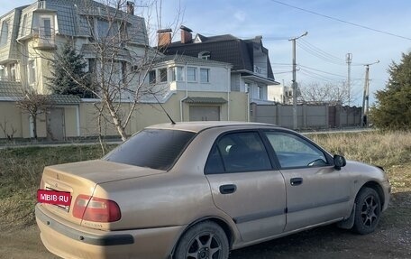 Mitsubishi Carisma I, 1999 год, 350 000 рублей, 3 фотография