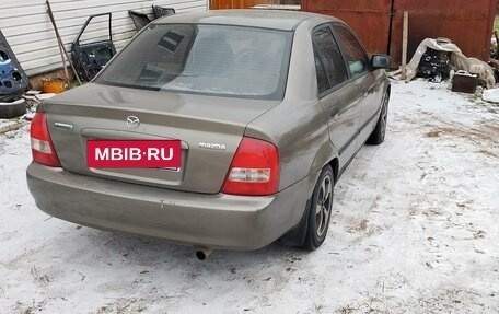 Mazda Protege, 1999 год, 135 000 рублей, 2 фотография