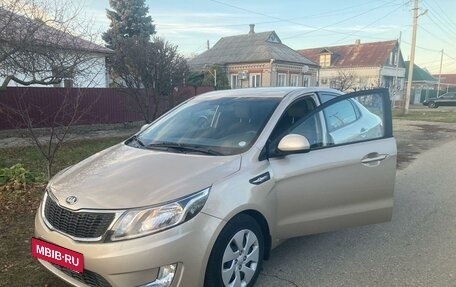 KIA Rio III рестайлинг, 2013 год, 1 250 000 рублей, 13 фотография