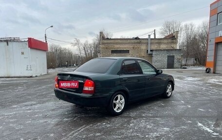 Mazda 323, 1998 год, 250 000 рублей, 3 фотография