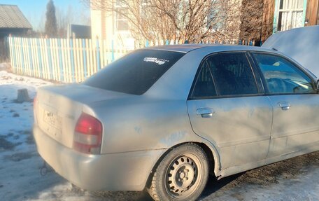 Mazda Familia, 1999 год, 230 000 рублей, 6 фотография