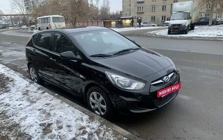 Hyundai Solaris II рестайлинг, 2011 год, 620 000 рублей, 13 фотография