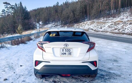 Toyota C-HR I рестайлинг, 2018 год, 2 400 000 рублей, 13 фотография