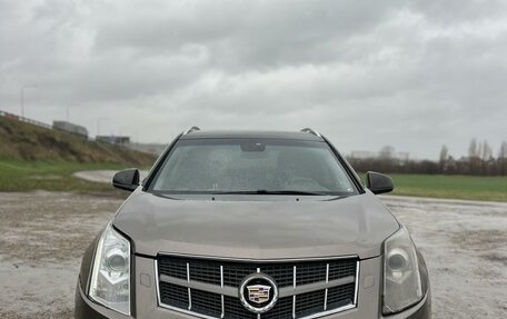 Cadillac SRX II рестайлинг, 2011 год, 990 000 рублей, 1 фотография