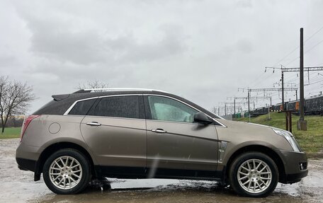 Cadillac SRX II рестайлинг, 2011 год, 990 000 рублей, 4 фотография