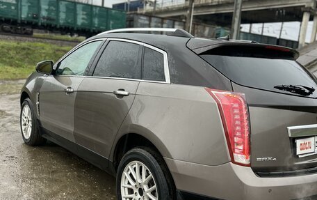 Cadillac SRX II рестайлинг, 2011 год, 990 000 рублей, 6 фотография