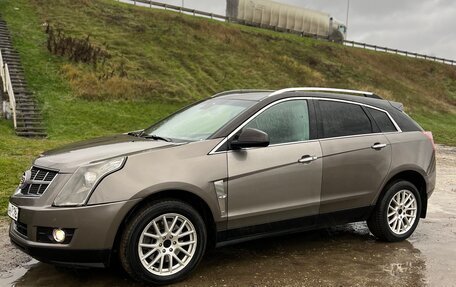 Cadillac SRX II рестайлинг, 2011 год, 990 000 рублей, 9 фотография