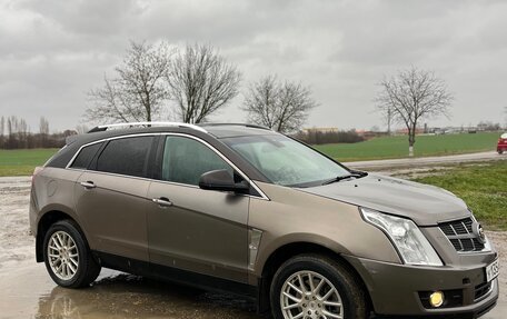 Cadillac SRX II рестайлинг, 2011 год, 990 000 рублей, 8 фотография