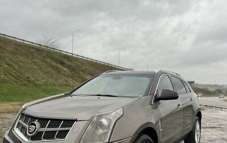 Cadillac SRX II рестайлинг, 2011 год, 990 000 рублей, 3 фотография