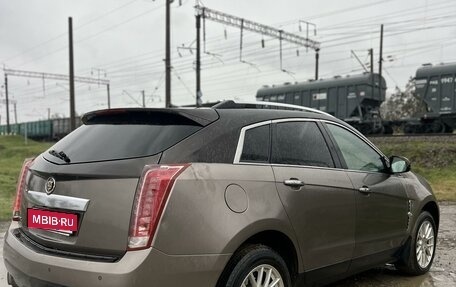 Cadillac SRX II рестайлинг, 2011 год, 990 000 рублей, 7 фотография