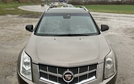 Cadillac SRX II рестайлинг, 2011 год, 990 000 рублей, 12 фотография