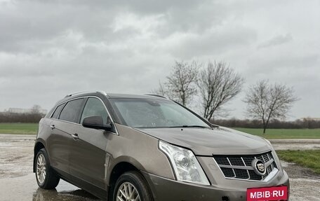 Cadillac SRX II рестайлинг, 2011 год, 990 000 рублей, 2 фотография