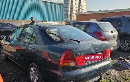 Mitsubishi Carisma I, 1997 год, 100 000 рублей, 6 фотография