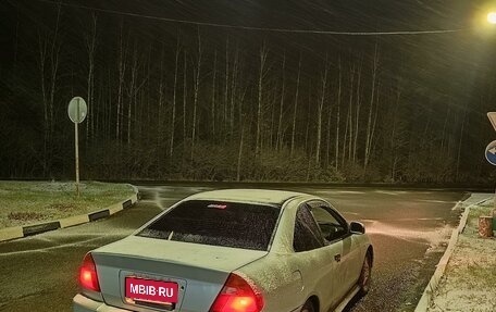 Mitsubishi Mirage VI рестайлинг, 2000 год, 400 000 рублей, 5 фотография