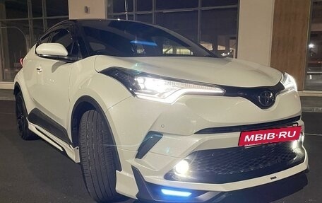 Toyota C-HR I рестайлинг, 2017 год, 2 600 000 рублей, 8 фотография