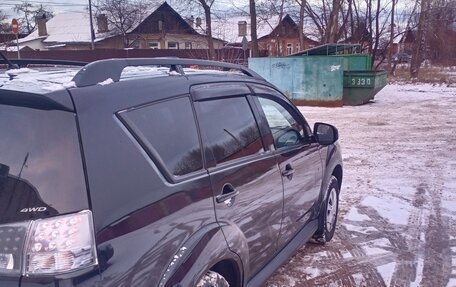 Mitsubishi Outlander III рестайлинг 3, 2011 год, 1 385 000 рублей, 10 фотография