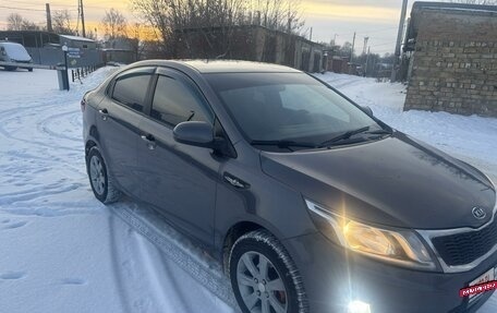 KIA Rio III рестайлинг, 2011 год, 750 000 рублей, 21 фотография