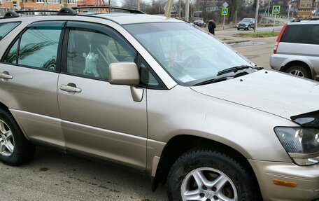 Lexus RX IV рестайлинг, 2000 год, 970 000 рублей, 10 фотография