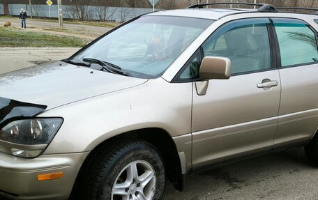 Lexus RX IV рестайлинг, 2000 год, 970 000 рублей, 5 фотография