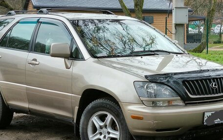 Lexus RX IV рестайлинг, 2000 год, 970 000 рублей, 4 фотография