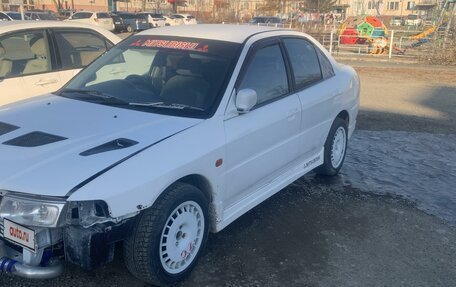 Mitsubishi Mirage VI рестайлинг, 1997 год, 230 000 рублей, 3 фотография