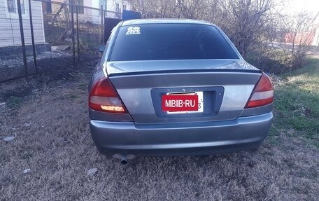 Mitsubishi Mirage VI рестайлинг, 1999 год, 350 000 рублей, 3 фотография