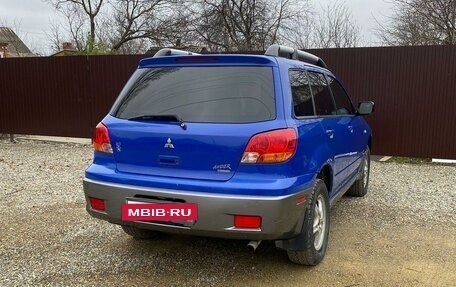 Mitsubishi Outlander III рестайлинг 3, 2004 год, 645 500 рублей, 4 фотография