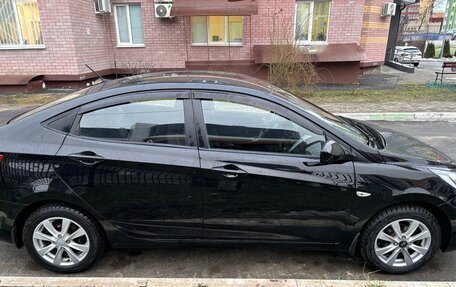 Hyundai Solaris II рестайлинг, 2011 год, 728 000 рублей, 2 фотография