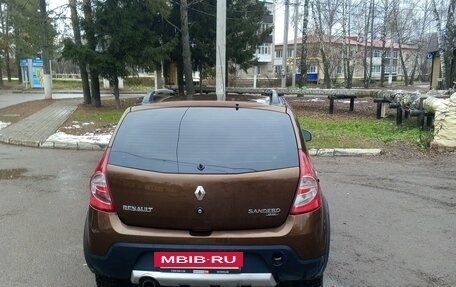 Renault Sandero I, 2013 год, 900 000 рублей, 4 фотография