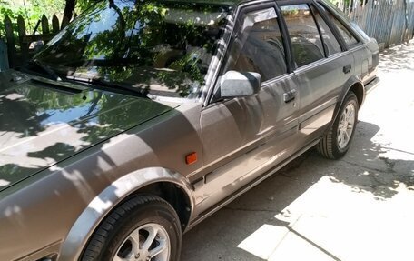 Nissan Bluebird VIII, 1990 год, 225 000 рублей, 2 фотография