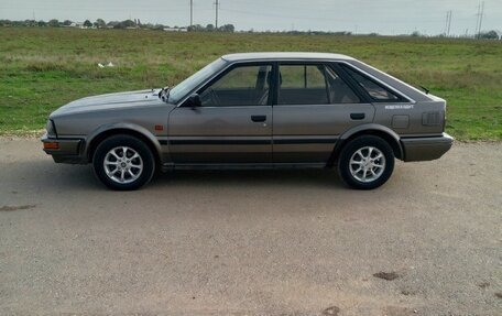 Nissan Bluebird VIII, 1990 год, 225 000 рублей, 6 фотография