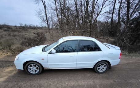 Mazda Familia, 2000 год, 400 000 рублей, 3 фотография