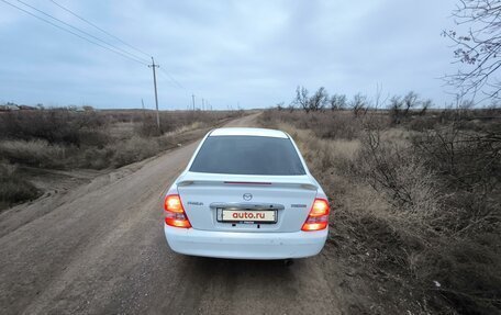 Mazda Familia, 2000 год, 400 000 рублей, 4 фотография