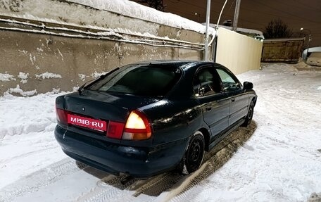 Mitsubishi Carisma I, 1997 год, 140 000 рублей, 4 фотография