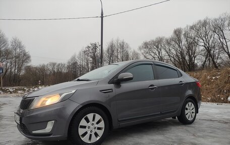 KIA Rio III рестайлинг, 2013 год, 1 000 000 рублей, 28 фотография