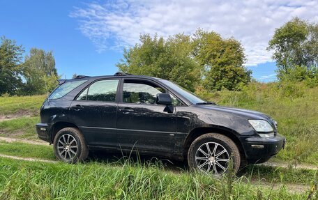 Lexus RX IV рестайлинг, 2001 год, 880 000 рублей, 3 фотография