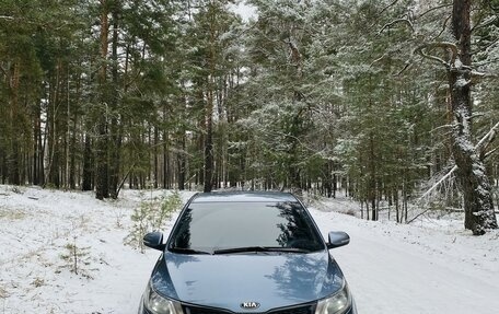 KIA Rio III рестайлинг, 2013 год, 1 040 000 рублей, 19 фотография