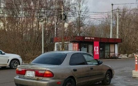 Mazda Protege, 1998 год, 190 000 рублей, 7 фотография