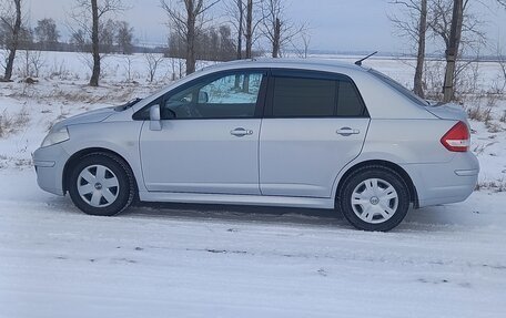 Nissan Tiida, 2010 год, 890 000 рублей, 7 фотография