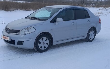 Nissan Tiida, 2010 год, 890 000 рублей, 9 фотография